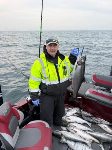 customer with king salmon from Whitehall Michigan