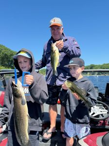 Grandpa takes Grandsons fishing on white lake in Whitehall